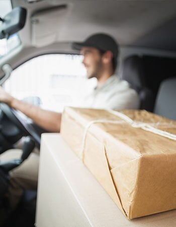 package being delivered in a car